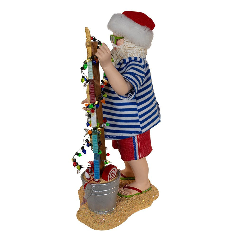 10.5“ Fabriché™ Battery Operated Beach Santa With Lighted Sign