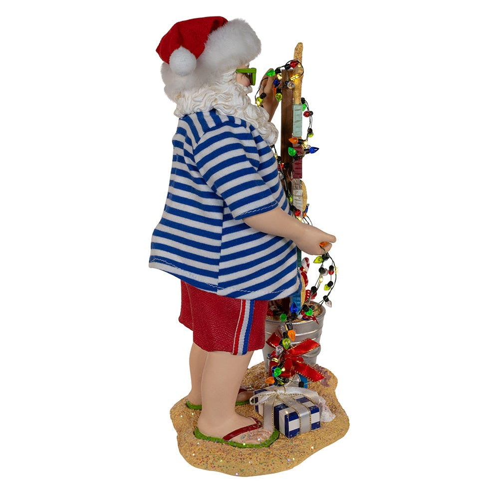 10.5“ Fabriché™ Battery Operated Beach Santa With Lighted Sign